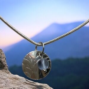 Color changing neodymium dichroic glass and sterling pendant. NWT